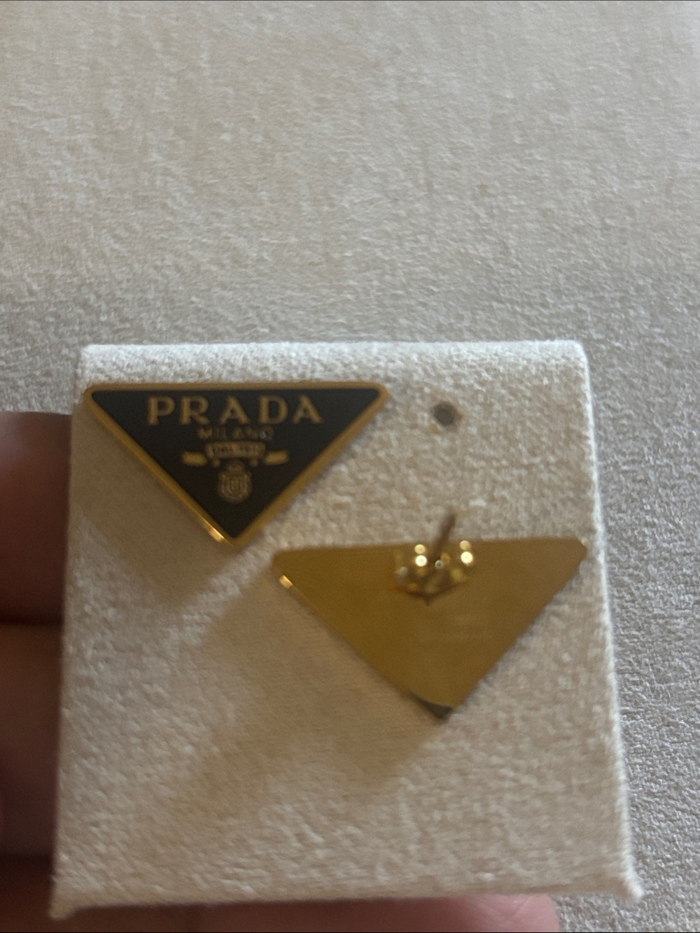 Logo Triangle Logo Studs in Black and Gold